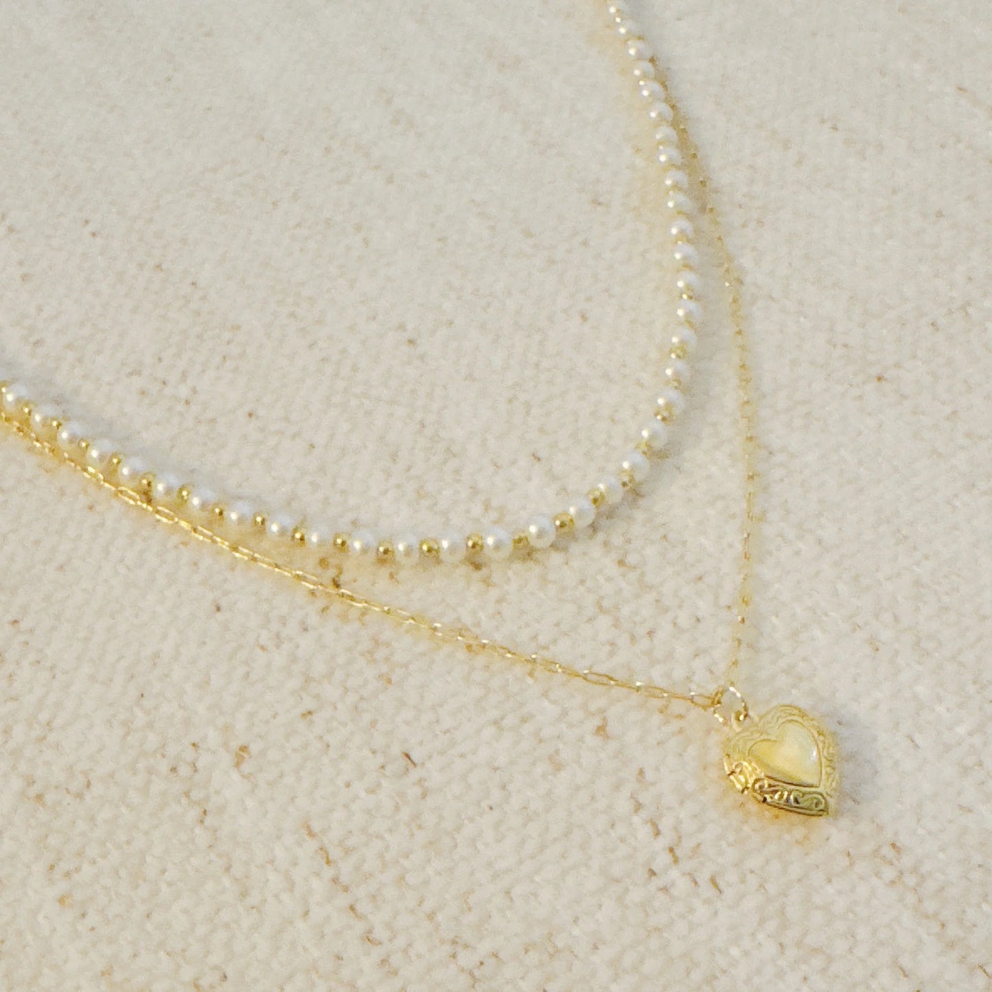 Layered Necklace with Pearls and Heart Locket