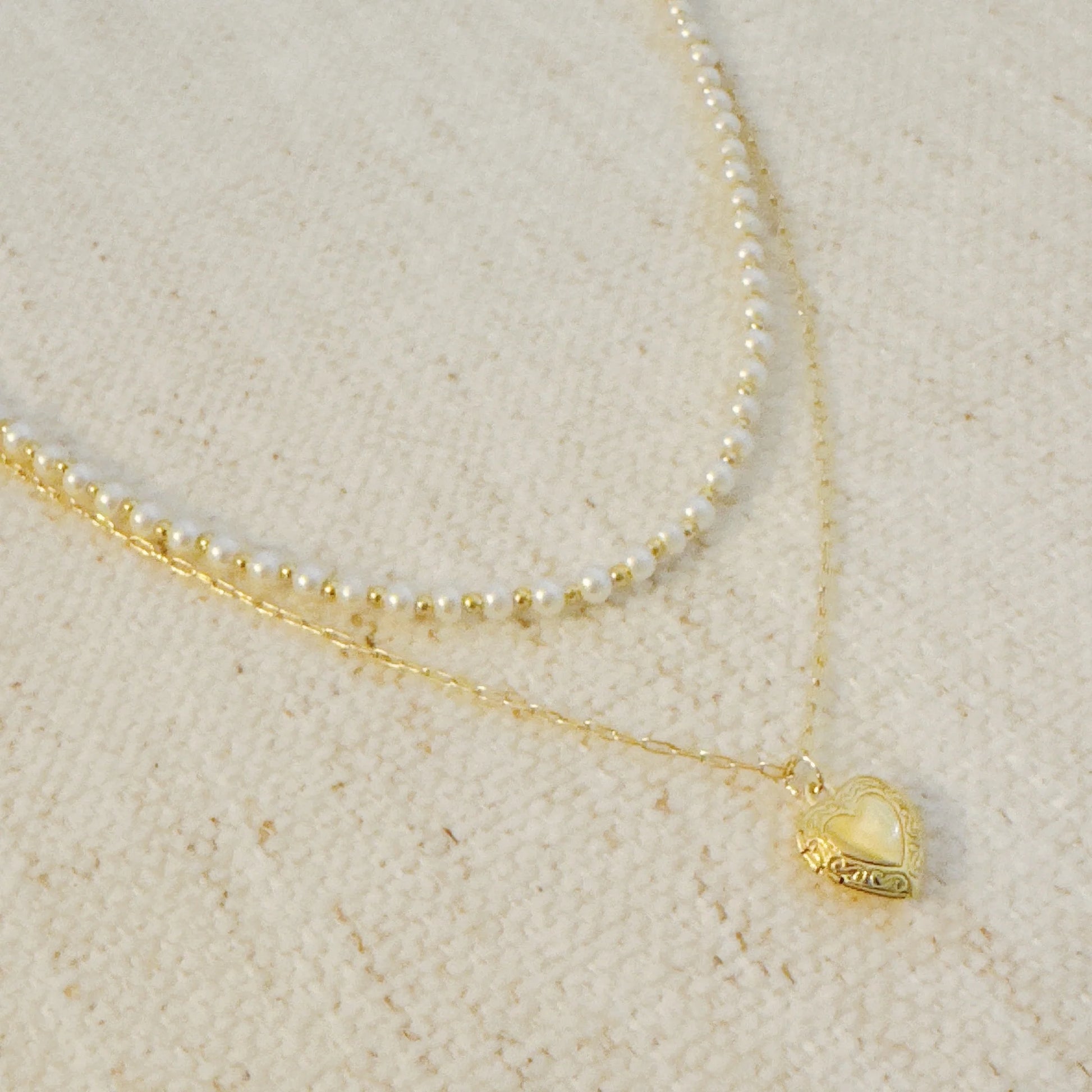 Layered Necklace with Pearls and Heart Locket