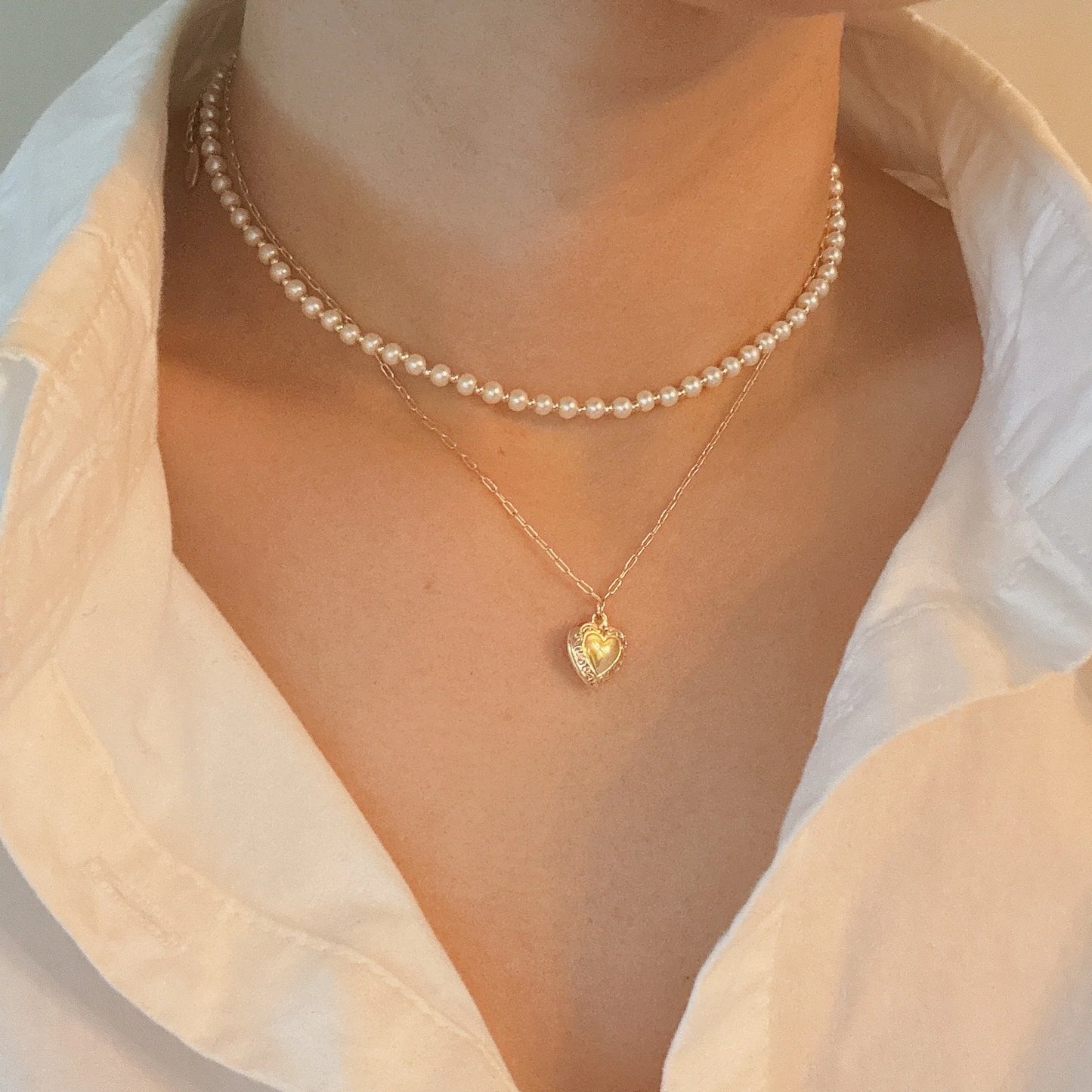 Layered Necklace with Pearls and Heart Locket