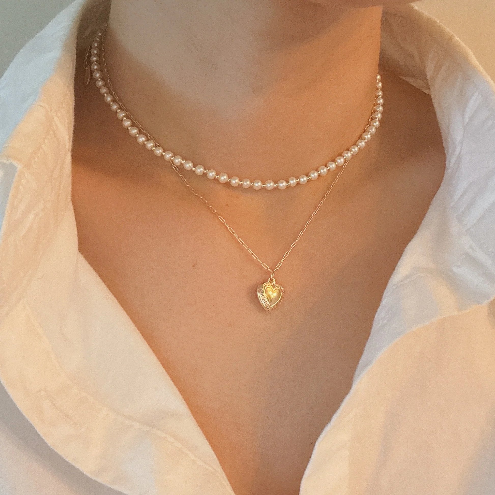 Layered Necklace with Pearls and Heart Locket