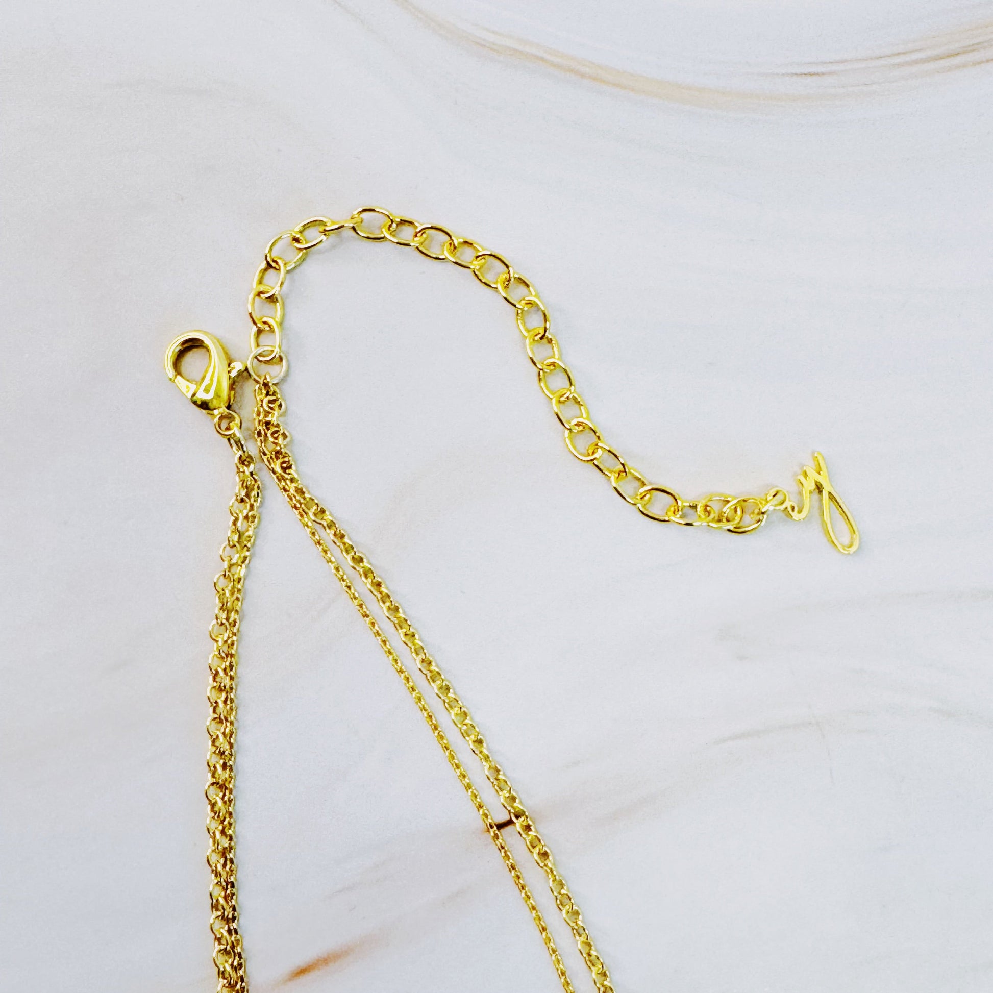 Layered Necklace with Cross and Coin Design